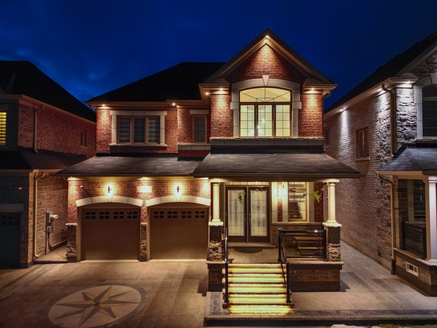 Exterior of a house lit at dusk