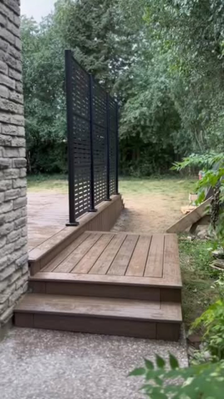 Composite deck with black privacy screens